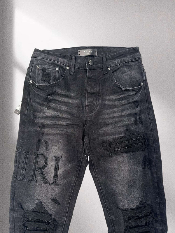 Amiri “Blackout Breakdown” Distressed Denim
