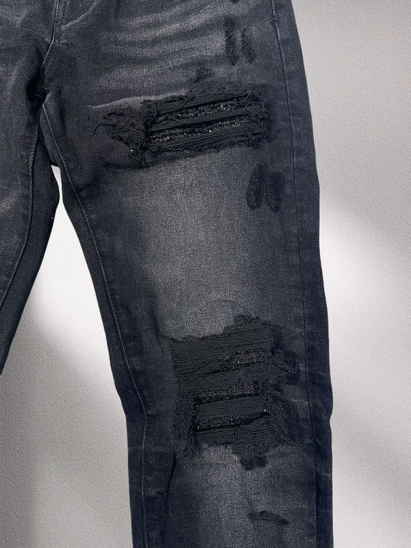 Amiri “Blackout Breakdown” Distressed Denim