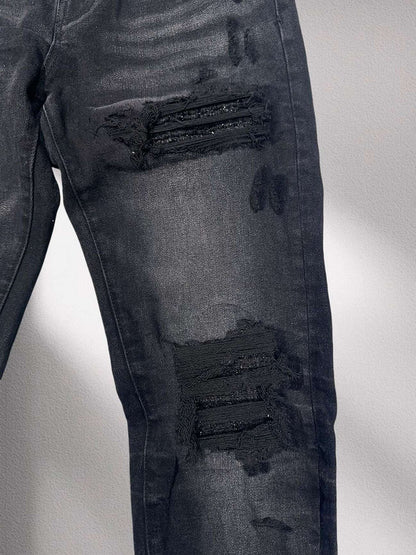 Amiri “Blackout Breakdown” Distressed Denim