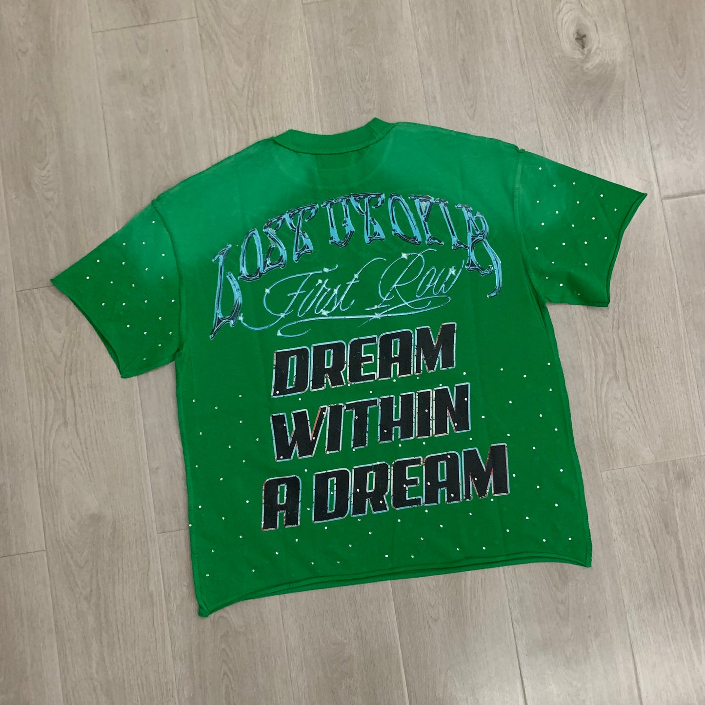 First row Utopia cropped tee